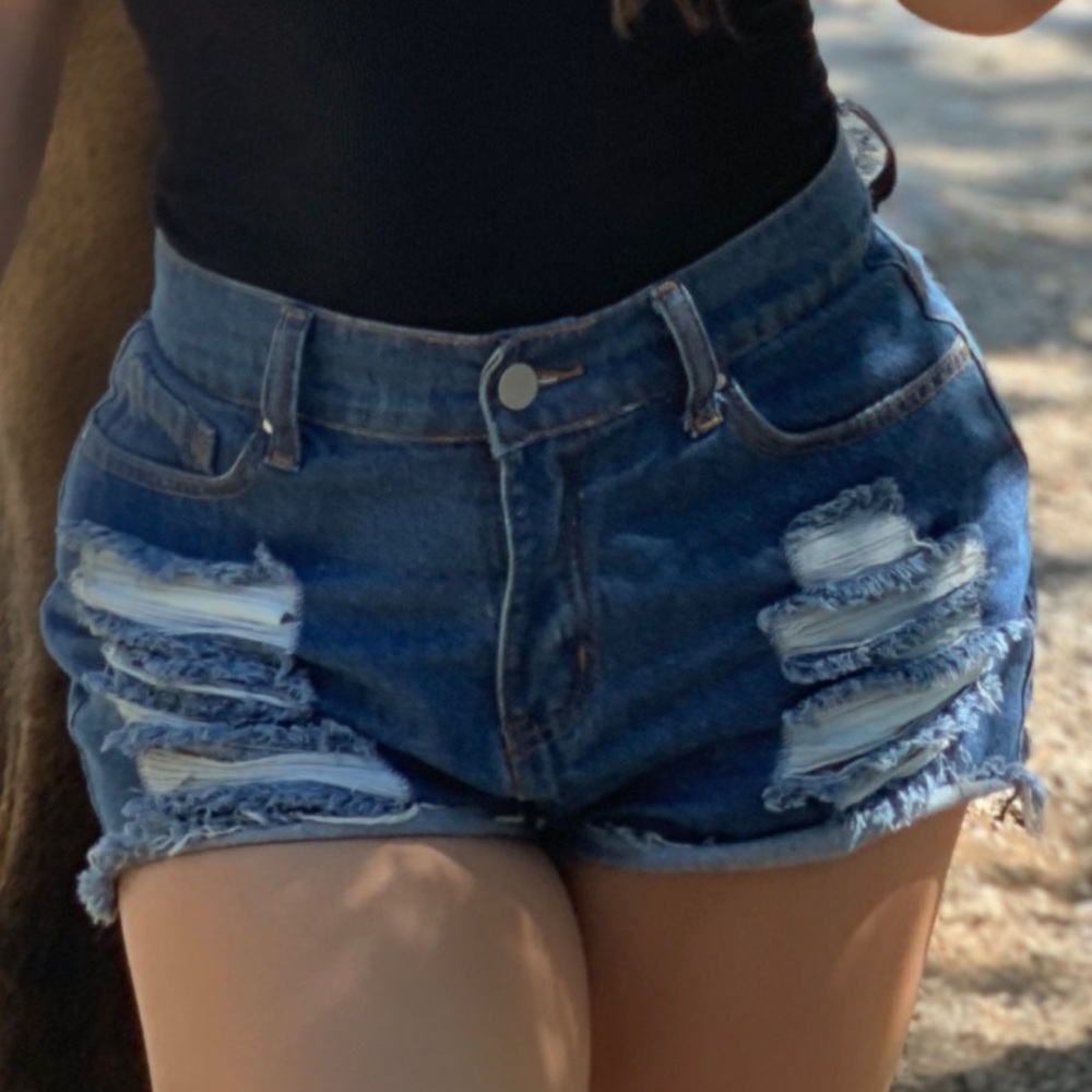 Distressed denim shorts